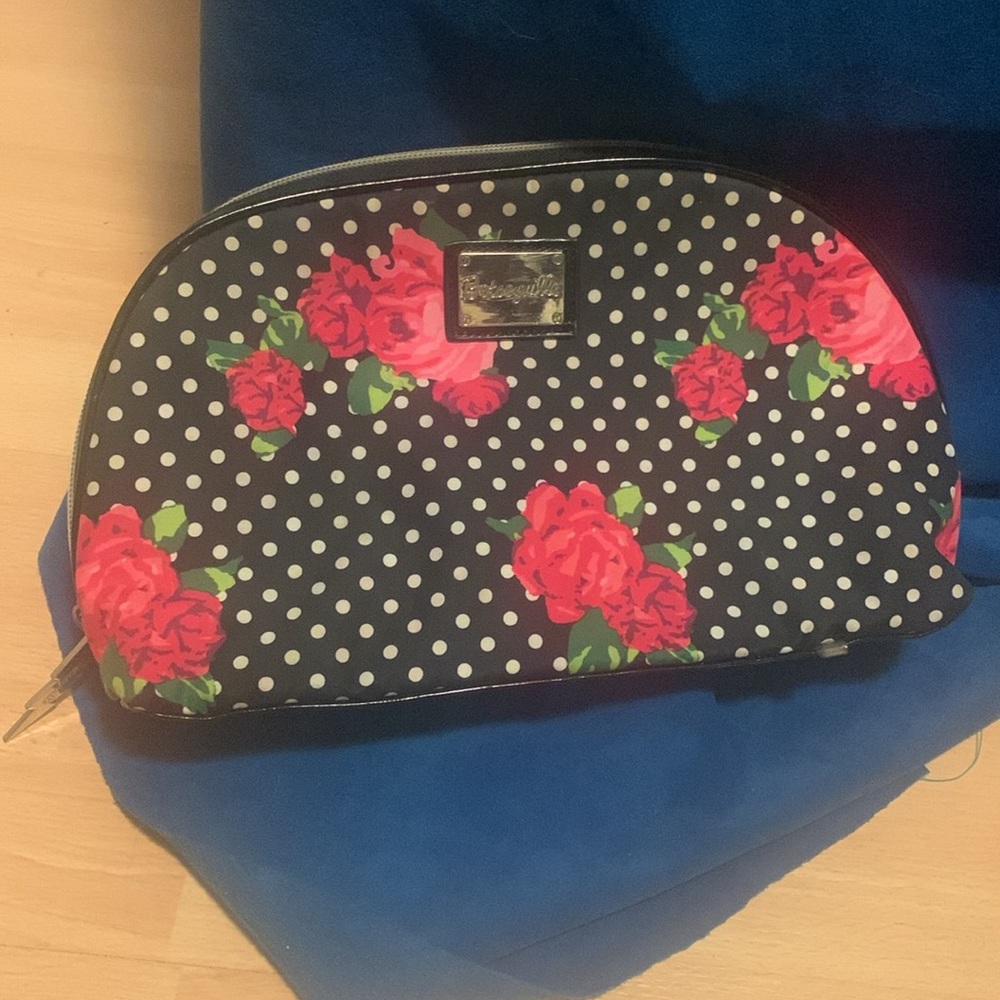 Betseyville large cosmetics case. Lightening bolt hardware. Clean inside